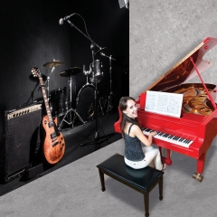 Woman playing the red grand piano